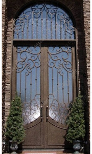MAIN FEATURES Air-tight seal around door, frame, and glass panel 2" Thick (by 6" wide) door panel for greater insulation 5/8 inch hand-forged iron scrollwork Steel is 12 gauge - the thickest available 2" thick door, 2-3/4" backset for hardware 